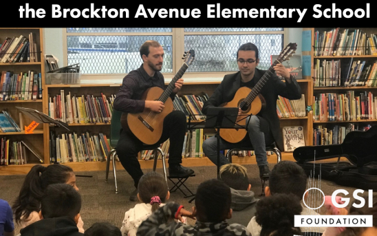 Students awarded with GSI Foundation Scholarship perform at the Brockton Avenue Elementary School