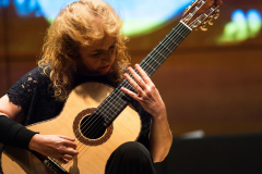 Classical guitarist María Esther Guzmán performing on one of the finalist classical guitars