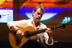 Flamenco guitarist Paco Serrano demonstrating one of the finalist flamenco guitars