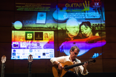 Flamenco guitarist Paco Serrano demonstrating one of the finalist flamenco guitars
