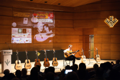 Flamenco guitarist Paco Serrano demonstrating one of the finalist flamenco guitars