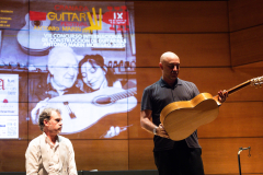 Alberto Cuéllar and Paco Serrano introducing one of the finalist flamenco guitars