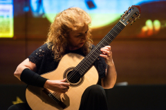 Classical guitarist María Esther Guzmán performing on one of the finalist classical guitars