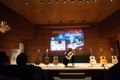 Classical guitarist María Esther Guzmán performing on one of the finalist classical guitars
