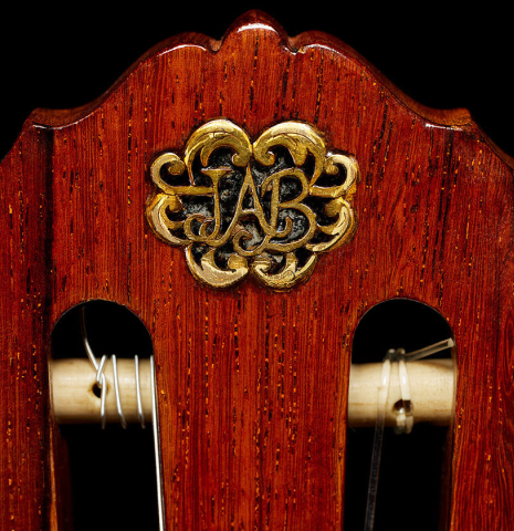The JAB initialed insignia in the headstock of a 1928 Hermann Hauser I (ex Julian Bream) classical guitar made of spruce and CSA rosewood