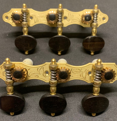 The front of Alessi Tuning Machines - Hauser 8 Brass Plates / Ebony Buttons