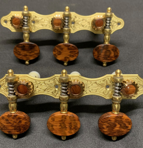 The front of Alessi Tuning Machines - Hauser 4 Brass Plates / Snakewood Buttons