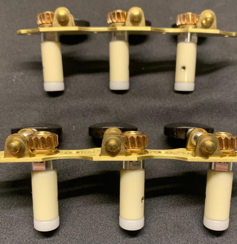 The back of Alessi Tuning Machines - Hauser 1937 Engraved Brass Plates / Ebony Buttons