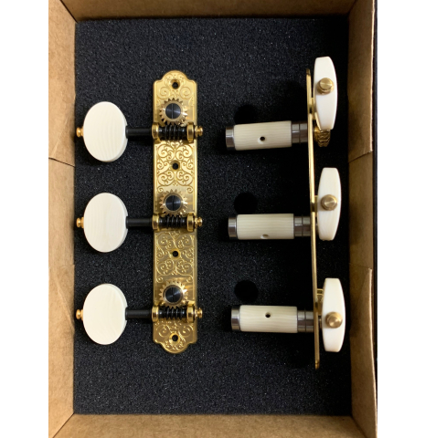 A set of Barnett “Trinity-B” Engraved Brass plate/ivoroid buttons/white rollers