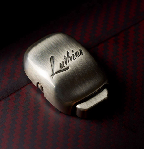 The latch on a “Luthier Series Classical Guitar Carbon Case” by Leona Cases - Matte Bordeaux