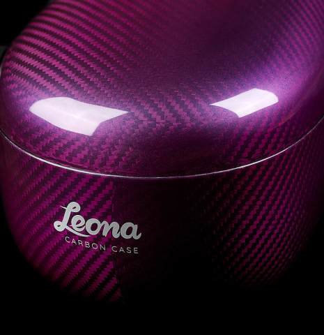 The glossy finish of a “Luthier Series Carbon Case” by Leona Classical Guitar Cases - Dark Pink