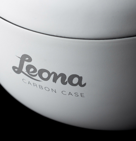 The logo on a “Luthier Series Carbon Case” by Leona Cases - Matte White