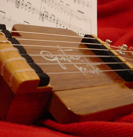 GuitarMute with sheet music