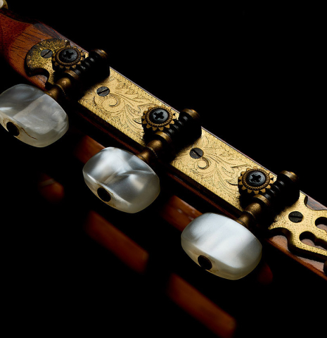 The tuning machines of a 1974 Marcelino Lopez classical guitar made of cedar and CSA rosewood