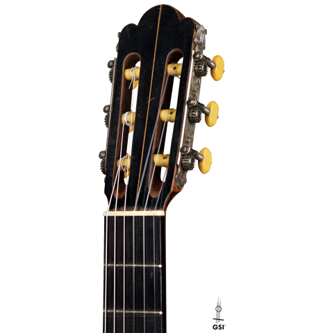 The headstock of a 1943 Miguel Gonzalez Abad classical guitar made of spruce and cypress