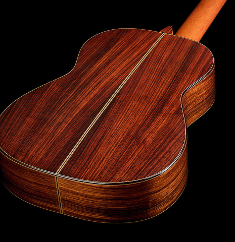 The back and sides of a 1996 Sergio Abreu classical guitar made of spruce and Indian rosewood