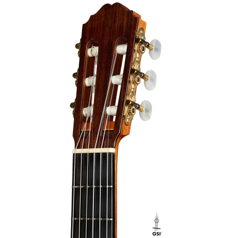 The headstock of a 1996 Sergio Abreu classical guitar made of spruce and Indian rosewood