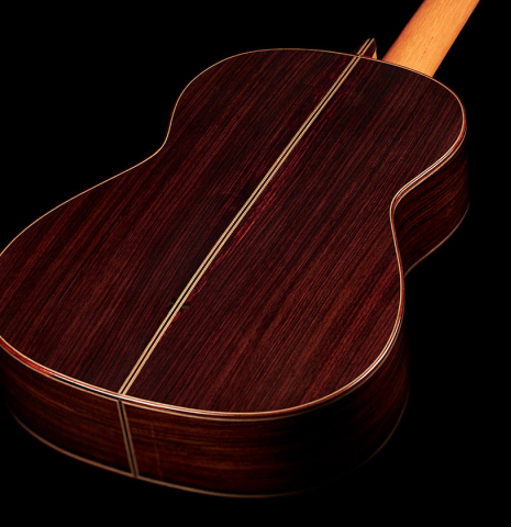 The back and sides of a 2023 Manuel Adalid "Hauser" classical guitar made of spruce and Indian rosewood