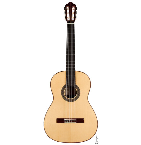The front of a 2023 Manuel Adalid "Hauser" classical guitar made of spruce and Indian rosewood on a white background