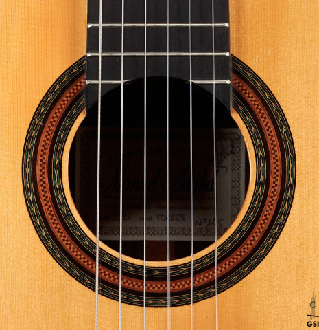 The rosette of a 2021 Manuel Adalid &quot;Torres&quot; classical guitar made of spruce and Indian rosewood