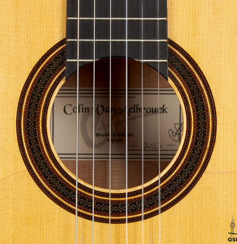 The rosette of a 2023 Colin van Aelbrouck flamenco guitar made of spruce and cypress