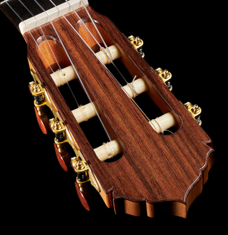The headstock and tuning machines of a 2024 Colin van Aelbrouck classical guitar made of cedar and Indian rosewood