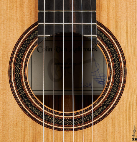 The rosette of a 2024 Colin van Aelbrouck classical guitar made of cedar and Indian rosewood
