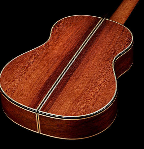 The back and sides of a 2025 Colin van Aelbrouck classical guitar made of spruce and African rosewood