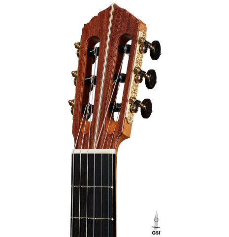 The headstock of a 2025 Colin van Aelbrouck classical guitar made of spruce and African rosewood