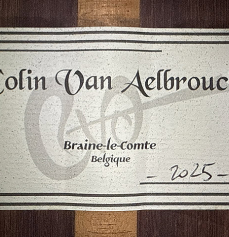 The label of a 2025 Colin van Aelbrouck classical guitar made of spruce and African rosewood