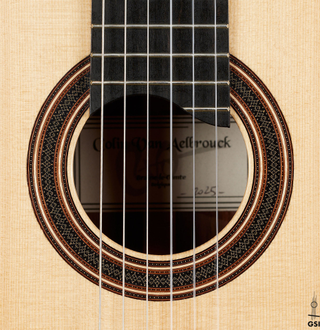 The rosette of a 2025 Colin van Aelbrouck classical guitar made of spruce and African rosewood