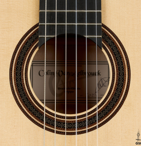 The rosette of a 2025 Colin van Aelbrouck "Rodriguez" classical guitar made of spruce and maple
