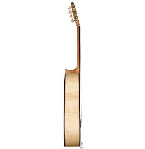 The side of a 2025 Colin van Aelbrouck "Rodriguez" classical guitar made of spruce and maple