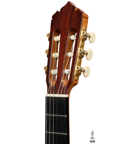 The headstock of a 2021 Alhambra “Mengual y Margarit NT” classical guitar made of cedar and Indian rosewood