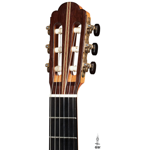 The headstock of a 2002 Simon Ambridge classical guitar made with spruce and CSA rosewood.