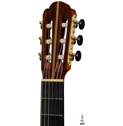 The headstock of a 2000 Simon Ambridge classical guitar made with spruce and Indian rosewood