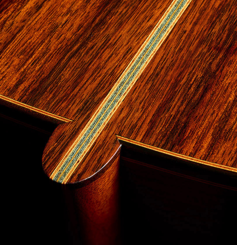 The heel, back binding and purfling of a 2000 Simon Ambridge classical guitar made with spruce and Indian rosewood