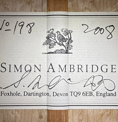 The label of a 2008 Simon Ambridge "1887 Torres SE 111" classical guitar made of spruce and maple