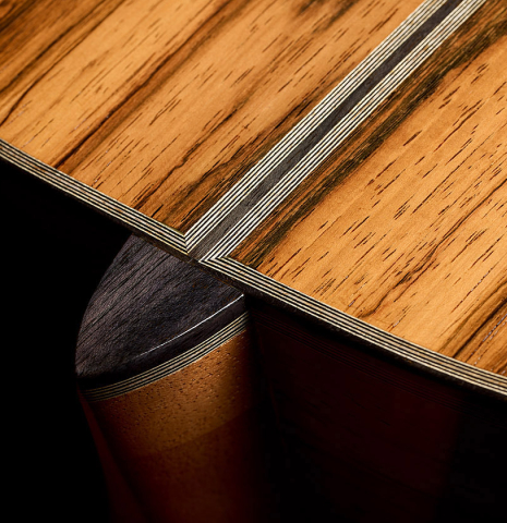 The heel, back binding and purfling of a 2025 Ariel Ameijenda "70th Anniversary" classical guitar made of Alerce and CSA rosewood