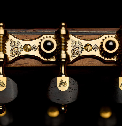 The tuning machine plate of a 2025 Ariel Ameijenda "70th Anniversary" classical guitar made of Alerce and CSA rosewood