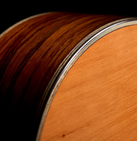 The top bindind and purfling of a 2026 Ariel Ameijenda "70th Anniversary" classical guitar made of alerce and CSA rosewood
