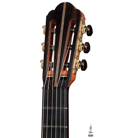 The headstock of a 2023 Ariel Ameijenda &quot;Confessional&quot; classical guitar made of cedar and Uruguayan blackwood