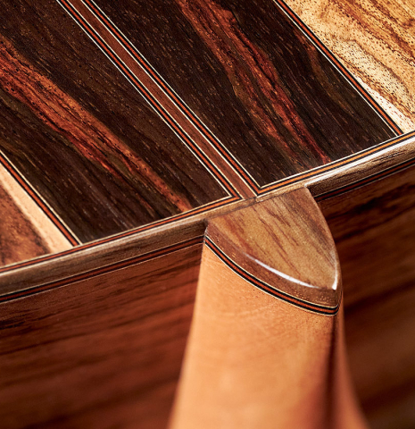 The heel of a 2023 Ariel Ameijenda &quot;Confessional&quot; classical guitar made of cedar and Uruguayan blackwood