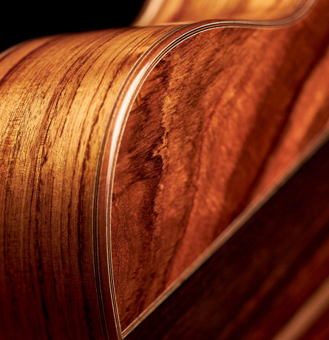 The side and binding of a 2022 Ariel Ameijenda &quot;Confessional&quot; made of alerce and Uruguayan blackwood