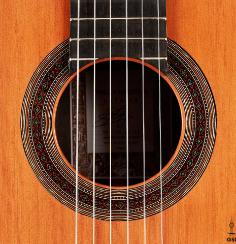 The rosette of a 2022 Ariel Ameijenda &quot;Confessional&quot; made of alerce and Uruguayan blackwood