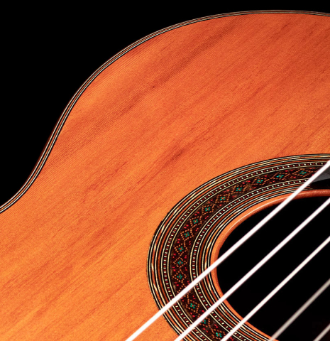 The soundboard and rosette of a 2022 Ariel Ameijenda &quot;Confessional&quot; made of alerce and Uruguayan blackwood