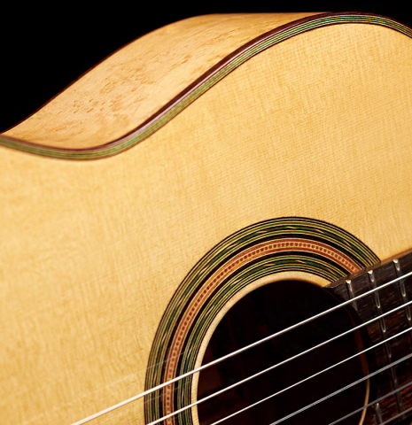 The top, sides and rosette of a 2023 Ariel Ameijenda "1885 Torres - SE 51" classical guitar made of spruce and maple