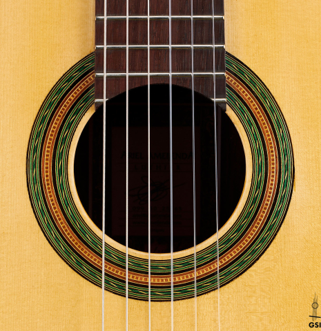 The rosette of a 2024 Ariel Ameijenda "1885 Torres - SE 51" classical guitar made of spruce and CSA rosewood