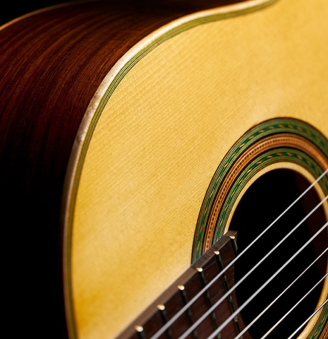 The top of a 2024 Ariel Ameijenda "1885 Torres - SE 51" classical guitar made of spruce and CSA rosewood