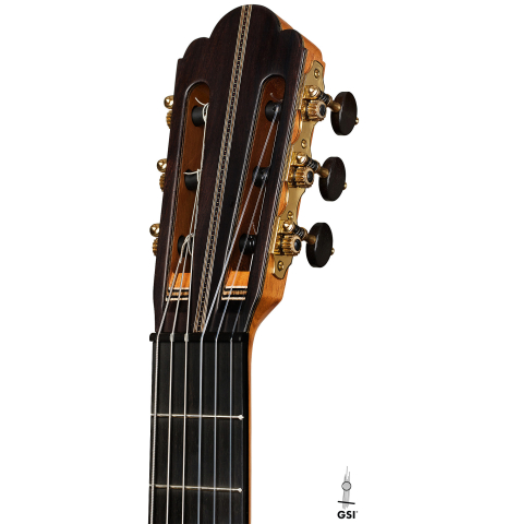 The headstock of a 2024 Ariel Ameijenda classical guitar made of cedar and CSA rosewood